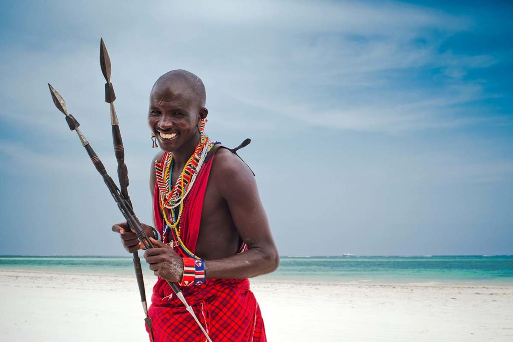 Maasai warrior, Diani Beach, image copyright Juliya Shangarey, Shutterstock | Travel Africa magazine